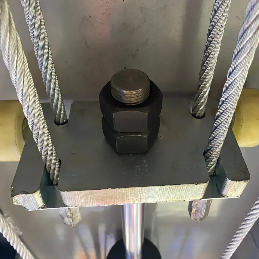 Pro King 10 XLT four post car lift with vehicle raised