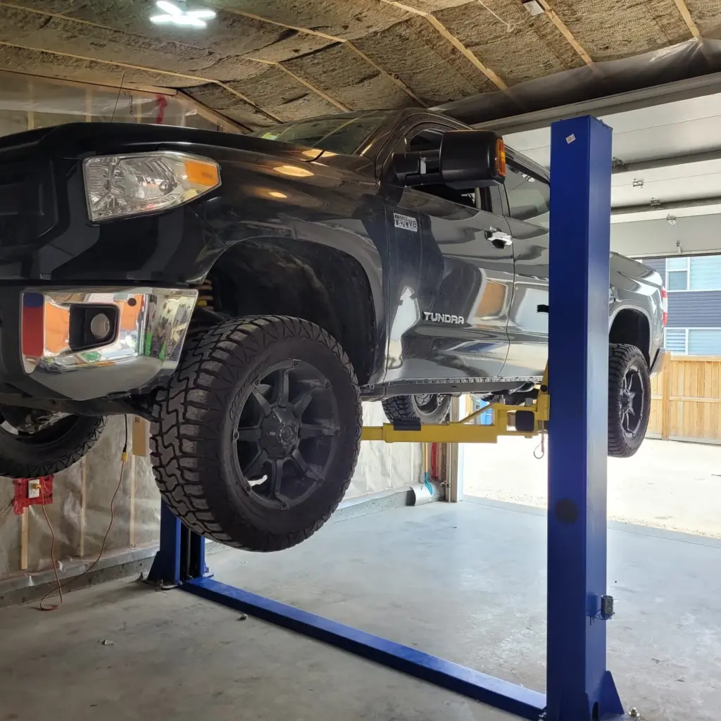 Pro King 9 two post car lift installed in a garage