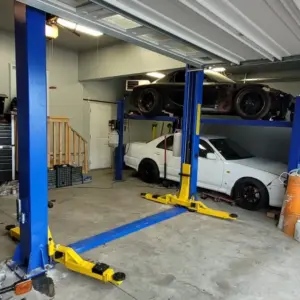 Pro King 9 two post car lift, arm and pad detail